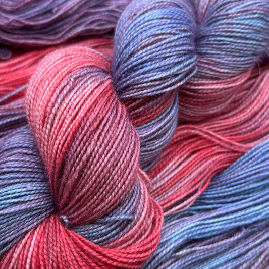 Violet Whispers stunning blend of lilac, red, and blue hues.